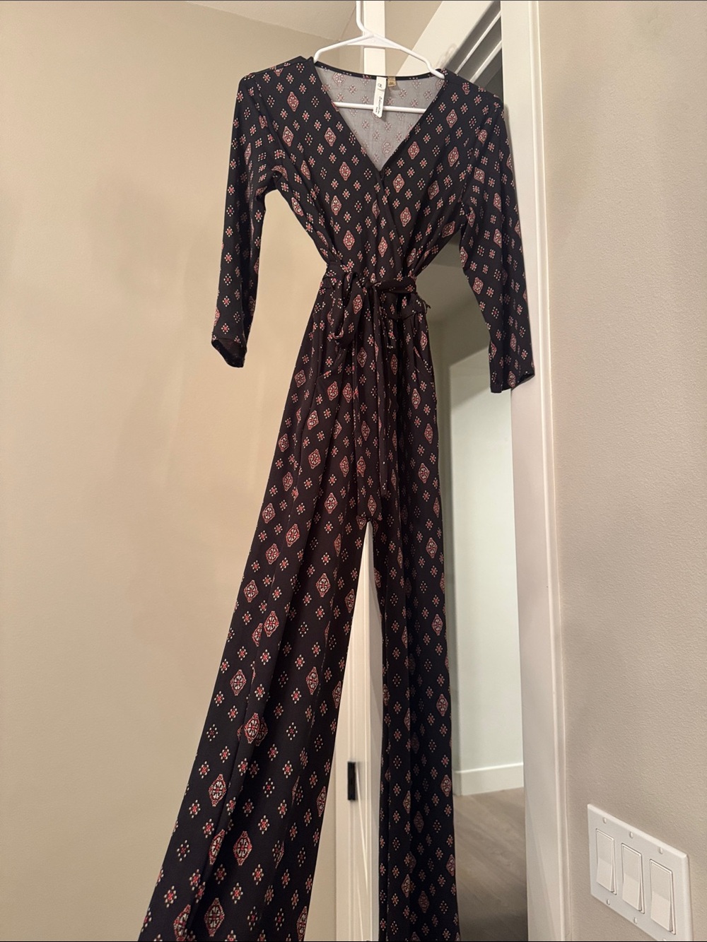 Collective Concepts Black Wrap Jumpsuit with Pink Diamond Print